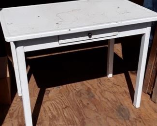 Antique porcelain enamel table 40 in wide 25 in deep