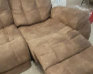 Couch with two recliners built in