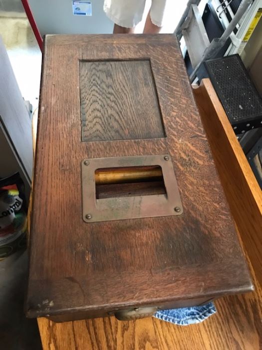 Oak antique adding machine. $225. 