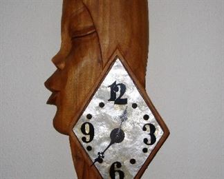 MID-CENTURY WOOD CARVED CLOCK