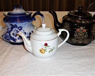 (LEFT) BLUE "IRON STONE VICTORIA WARE", (RIGHT) BLACK FLORAL "ENGLAND AORIATIC GIBSONS & SONS" TEAPOTS