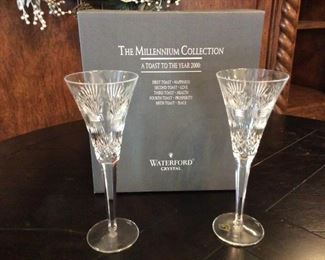 Universal Toasts Flutes from the Waterford Millennium Collection each set represents the five toasts....Happiness, Love, Health, Prosperity and Peace