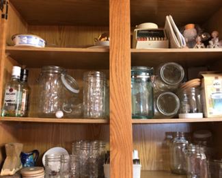 Canning jars, glass storage bottles, vintage Oster blender (glass container included), vintage tchotchkes, knick-knacks, Mexican pottery