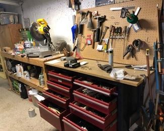 yes, more tools, the cabinet to the left is full of hardware, multiple organizer boxes full of hardware