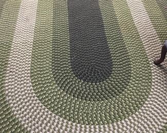 Large Mid Century Braided Rug
   9’ x 11’
Smaller Matching Rugs Also Available