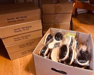 Brand new still in packages “wet brushes”- boxes of them.