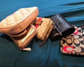 sample -just a few of the wallets  we have  kors- spade-coach-brighton - 