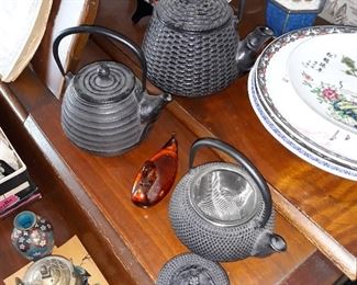 Vintage Chinese teapots with strainers