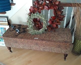 Upholstered  bench and wreather
