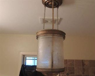 vintage copper and glass light that was converted to electric lighting