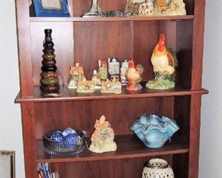 Bookcase.  Home Decor, art glass, frames, David Winter cottages