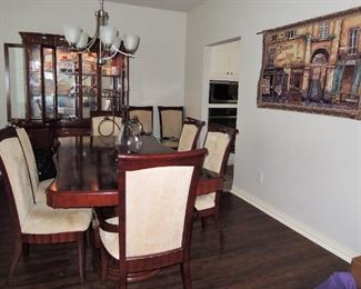 Dining room Table with 6 chairs. China cabinet buffet