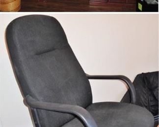 Desk and office chair.  Large screen monitors