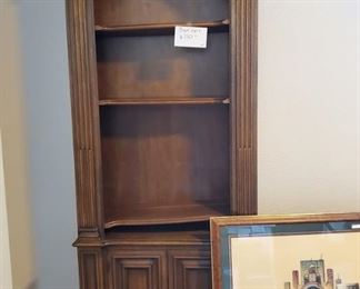 Furniture shelf.  Framed Sante Fe art