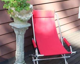 Cement Pedestal with Potted Plant and Patio Chair