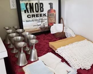 linens, pewter goblets and Knob creek mirror