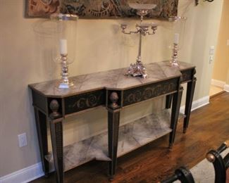 Marble Topped Console Table with Decorative Hurricane Style Lamps and Decorative Serving Piece