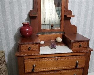 Early American marble top dresser