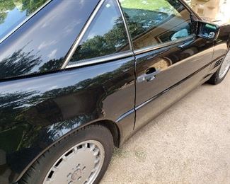 Cloth convertible also comes with a removable hard top