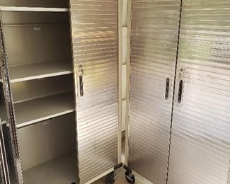 Two stainless steel rolling storage cabinets
