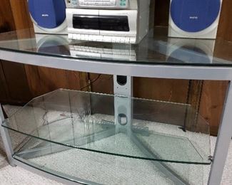 Glass media stand