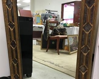 Variety of mirrors: wrought iron framed, 23.5" x 43.25"; framed 27"x39"; vintage 48"x36"; beveled 24"x36"