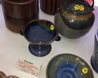 Signed ceramic dishes. Raccoon, vintage Pigeon Forge Pottery signed by Douglas Ferguson.