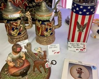 Musical beer steins, music box from Switzerland. Vintage liquor holder and music box playing "How Dry I Am."