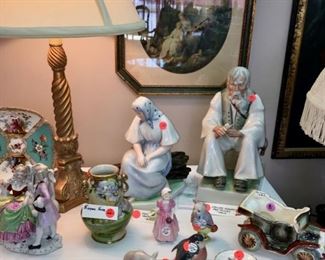 2 Figures, Zsolnay Hungarian "Tercia" and "Birzasae" (rear right). Relpo 1949 antique car. Lladro pigs. Nippon vase. Beatrix Potter figurine, Beswick, England.