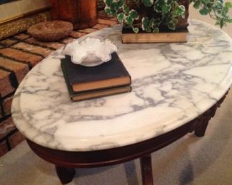 Oval marble top antique coffee table