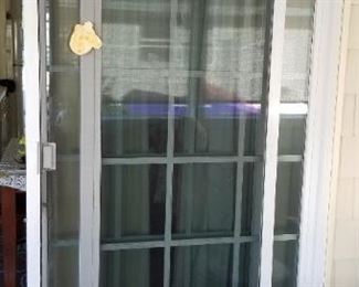 Sliding glass door nearly new