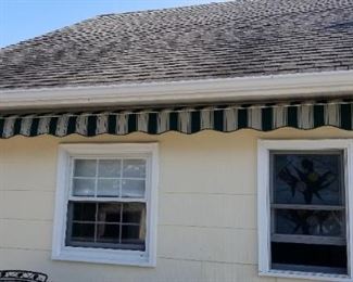 Newer electric awning with remote control. Approx. 14 ft. wide; extends approx. 12 ft.