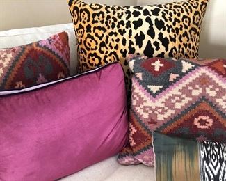 Lots of cool pillows by Anthropologie, West Elm, Pottery Barn, in many fabrics and colors.