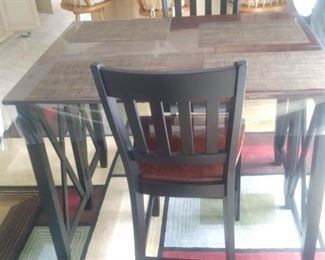 Pub table with two matching chairs and matching server