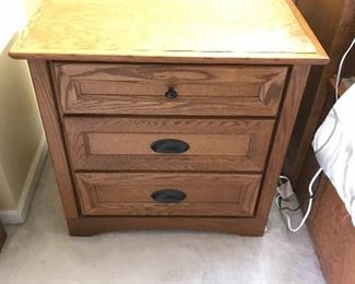Cherry nightstand which is part of the four piece bedroom set
