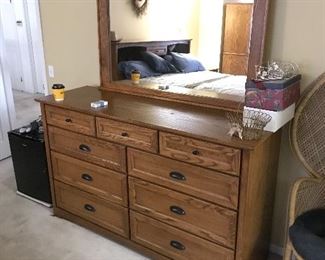 Cherry bureau with the mirror which is part of the four piece bedroom set