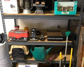  Coolers, watering can, pet taxis, cassette tapes and Large variety of snow brushes