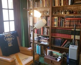BOOKS and several Vacuum cleaners, Floor to Ceiling Lamp.