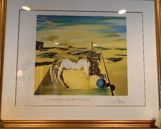 SALVADOR DALI'S - " Caesar in Dalivision"  
S/N  # 37/100.  Published  by Barclay Gallery L.T.D.  New York, New York
Artist: Salvador  Dali 
Gold color frame - print is signed & numbered - embossed  on both sides