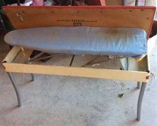 cute bench with ironing board inside, very unique