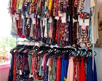 Brand New LuLaRoe clothes - Shirts, dresses, and tights - All Sizes -  Clothes racks are available for sale.