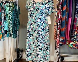 Brand New LuLaRoe clothes - Shirts, dresses, and tights - All Sizes -  Clothes racks will be available for sale. Another full-size mannequin