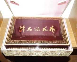 Chinese box with paint brushes