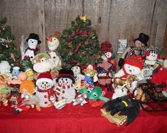 Snowmen, cupid doll, baby bean doll, Batman, Annie, thumbkin dolls, Troll doll, small trees, sleighs, frogs
