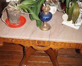 marble top table, plants