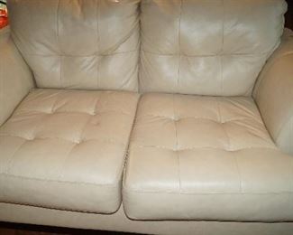 white leather love seat