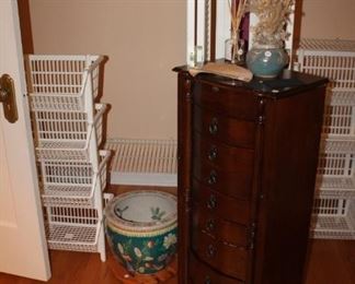 Jewelry cabinet is sold.