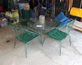 Stylish wrought iron patio set w/ table and 4 chairs