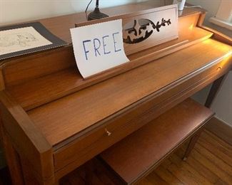 Spinet piano with bench and sheet music is FREE but must removed by buyer