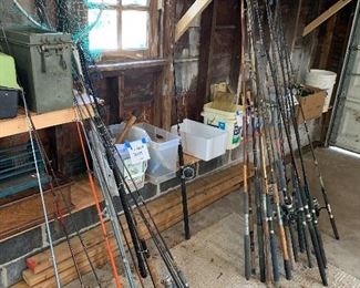 Fishing rods plus lot of fishing supplies and reels